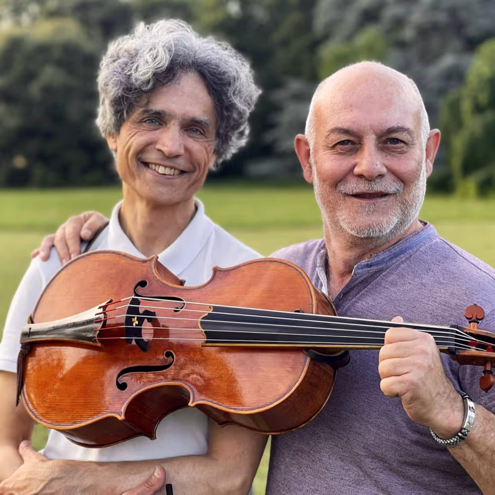 Vicenza, 2024. Dmitry Badiarov working with string maker Mimmo Peruffo in Vicenza, continuing violoncello da spalla string development begun in 2003 