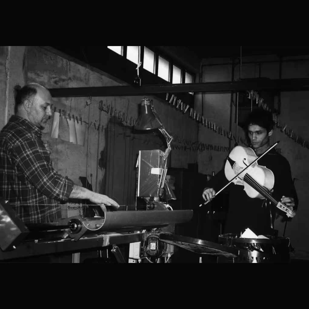 Working with Mimmo Peruffo in Vicenza on string development for the violoncello da spalla in 2004