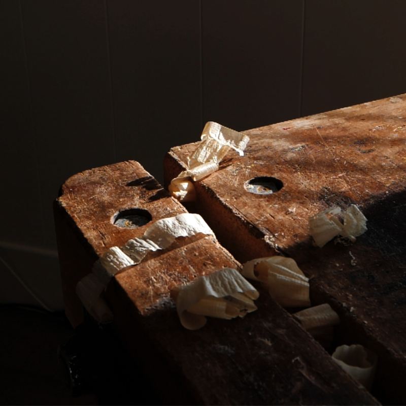 The warm, sun-drenched corner of the workbench